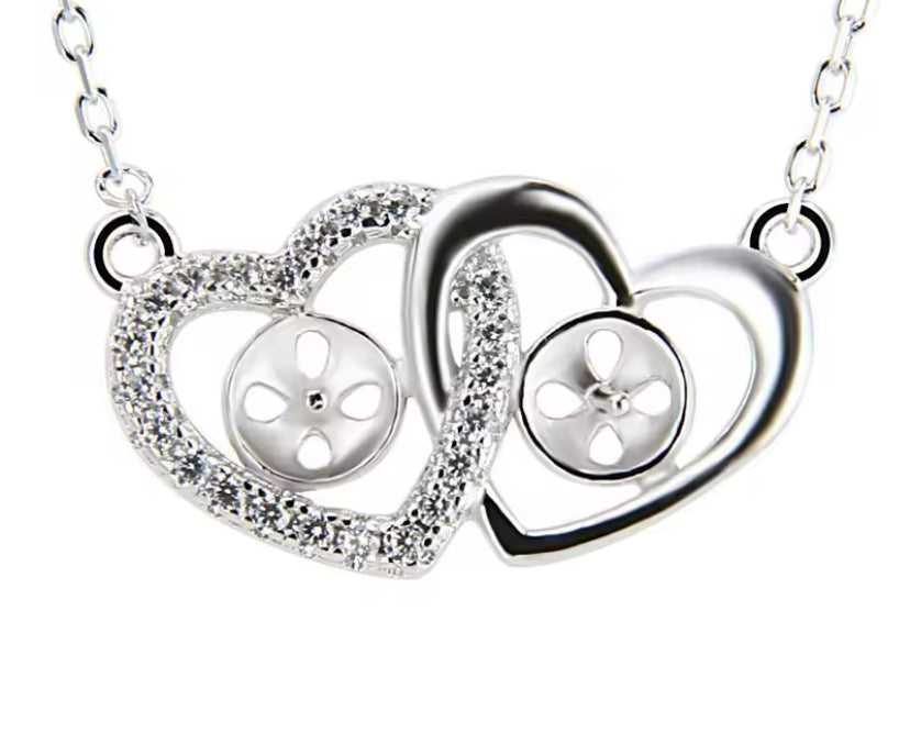 Double heart pendant